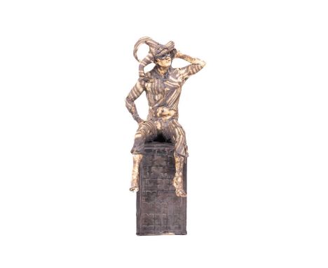 April Young (contemporary), 'Jester', a painted ceramic figure, the jester seated on a rectangular plinth, 43 cm high.Alexand