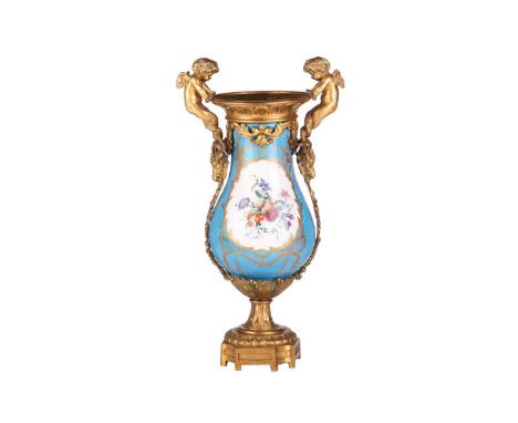 A French Napoleon III Sevres porcelain baluster base painted with scattered blooms and fruits on a Blu Celeste ground mounted