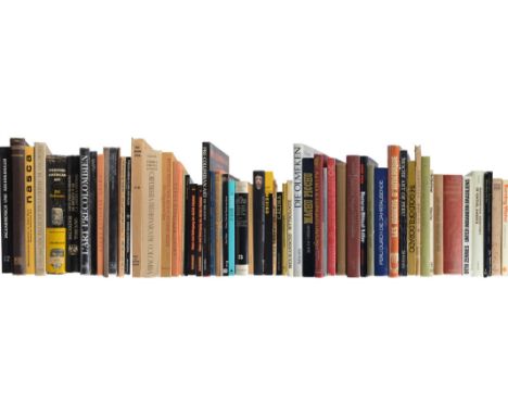 A library of Pre-Columbian related books including Artes rituales del Nuevo Continente - America Precolombina, 1997; Perou, L