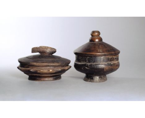 A Lozi bowl and cover Zambia oval with a scalloped girdle and with a fish finial to the cover, 25cm long, and a Lozi circular