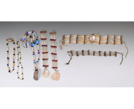 A Plains choker dentalium, leather, shell and buckskin, 32.5cm long, a pair of similar earrings with shell pendants, a small 