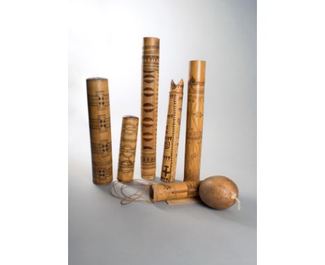 Two Papua New Guinea bamboo pipes with incised linear and geometric decoration, the smaller inscribed Native Pipe From the Mo