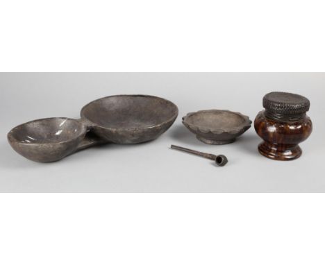 An Ifugao bitangnge bowl Philippines with a large main bowl and linked smaller spice bowl, 38.5cm long, a Ifugao duyu bowl, a