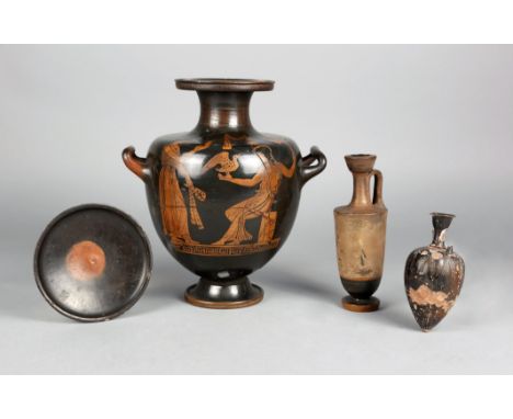 A Greek red-figure hydria circa 4th century BC pottery with a standing robed female holding a sash and a alabastron and a sea