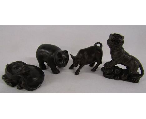 4 wooden netsuke, signed - water buffalo, bear, bull and tiger