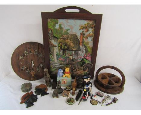 Collection of items includes - tapestry fire screen, wooden barrel lid wall clock, stone African figure, Winnie the Pooh salt