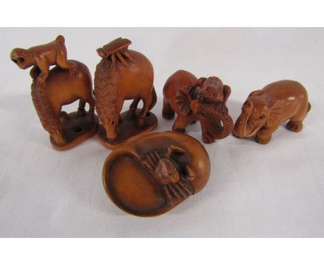 5 Wooden netsuke, signed - monkey on a horse, bug on a horse, frog on an elephant, elephant and crab on a shell