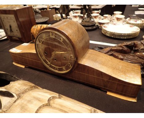 Oak cased large mantel clock ( key in clock ) 