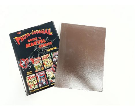 Photo Journal Guide to Marvel Comics Deluxe Limited Edition, in slipcase, worn dust jacket, book in excellent condition.