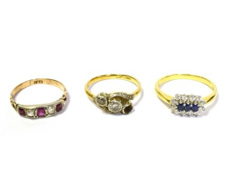 18CT SAPPHIRE RUBY &amp; DIAMOND SET RINGS to include a three stone oval sapphire and diamond cluster, an antique ruby and ol