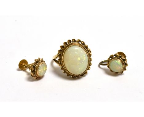 9CT GOLD WHITE OPAL RING AND EARRINGS ring set with an oval cabochon solid white opal 14.1 x 11.4mm, estimated 4.0 carats, wi