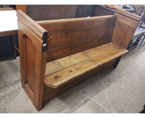 A Victorian pine church pew 