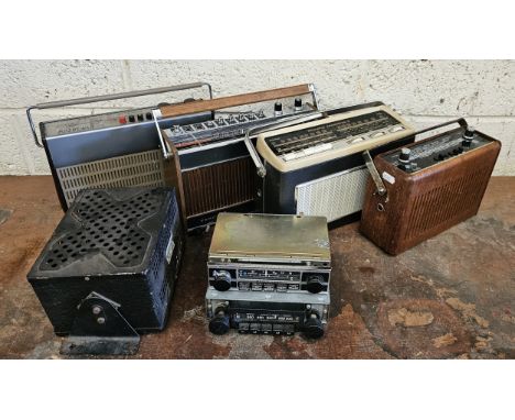 Four transistor radio's with "Car" button to enable use, a Smith Radiomobile amplifier and two other car radios 