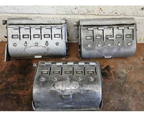 Three bus conductor ticket machines 