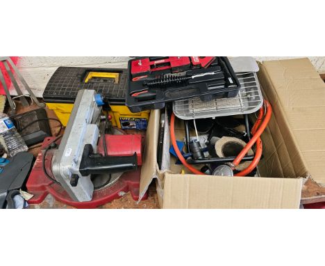 A quantity of tools to include a chop saw 