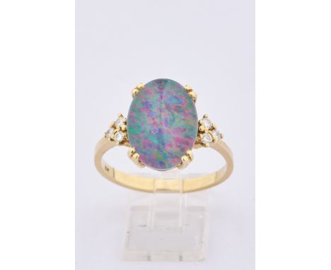 Ring, GG 585, Opal, 6 Brillanten zus. ca. 0.03 ct., RM 18, 4.21 g