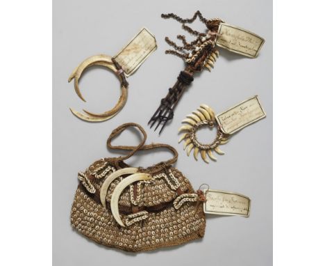 Jewellery, a comb and a bagA small collection of Papua New Guinea Jewelry and a comb.Fibers, teeth with museum labels from th
