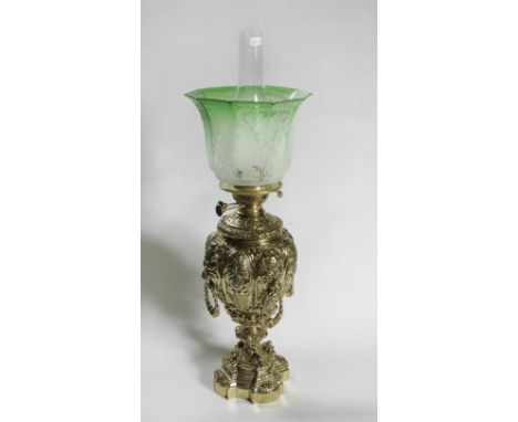 HEAVILY DECORATED BRASS BASED OIL LAMP WITH LIONS HEAD HANDLES & STUNNING ANTIQUE GREEN SHADE 
