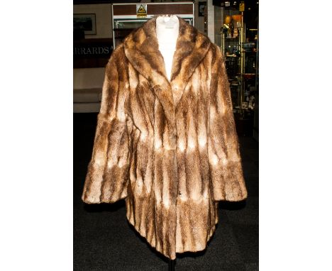 Ladies Three Quarter Length Musquash Coat, fully lined. Slit pockets,