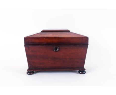 Early to Mid 19th Century Mahogany Sarcophagus Shaped & Lidded Twin Compartment Tea Caddy standing on 4 ball feet. Complete w