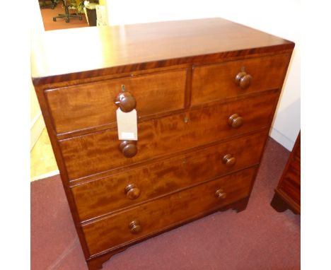 A Victorian mahogany chest of two short over three long drawers raised on bracket feet, H:97cm W:91cm D:50cm
