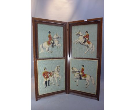 A 19th Century mahogany fire screen with pictorial tapestry panels. 