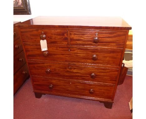 A Victorian mahogany chest of two short over three drawers raised on bracket feet, H:102cm W:105cm D:53cm