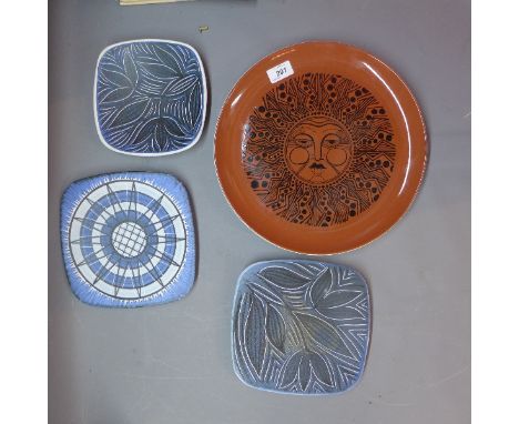 A Poole pottery plate with sun design, signed Carole Holden with makers stamp with designer Norwegian plates having blue flow