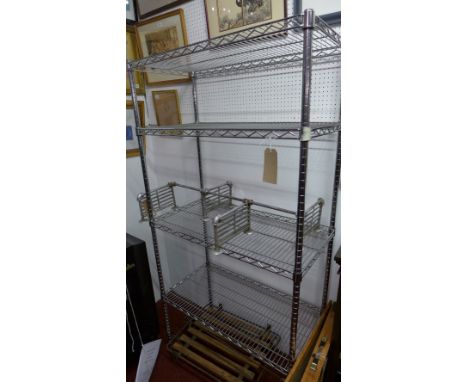 A stainless steel catering shelf unit. 