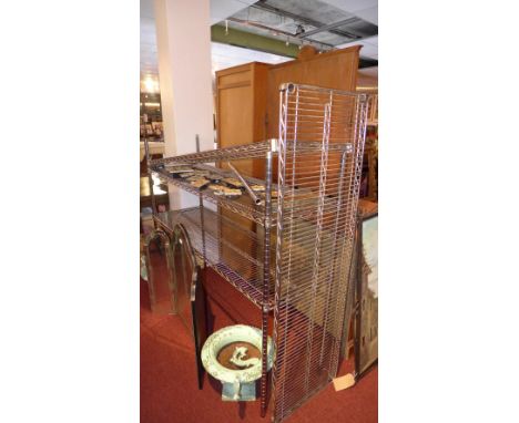 A stainless steel catering shelf unit. 