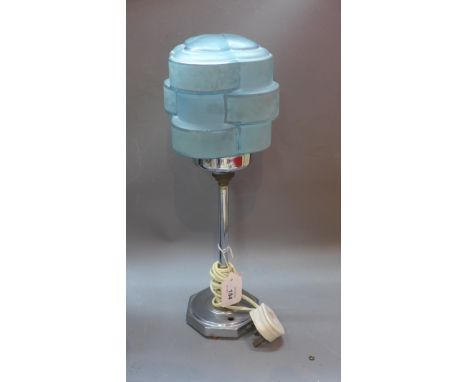 An Art Deco chrome table lamp with frosted blue glass shade 