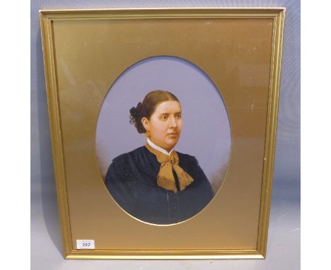 An oil painting portrait possibly cover a photograph in oval matting. 