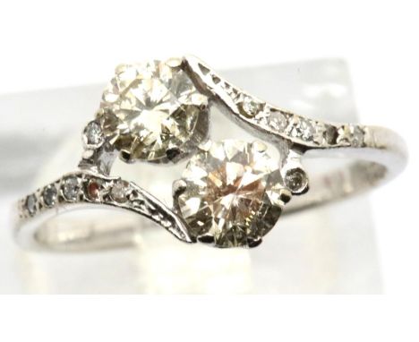 Vintage 1920s 18ct white gold diamond engagement ring, the crossover set champagne coloured stones totalling 1cts, with diamo