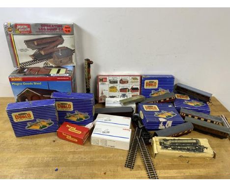Railway Interest:-  A mixed lot including Hornby Duplo level crossings, train carriages, a Rovex engine, a Hornby Magna goods