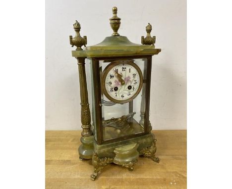 A late 19th early 20thc mantel clock of architectural form with onyx top and base, enamel dial with floral decoration, measur
