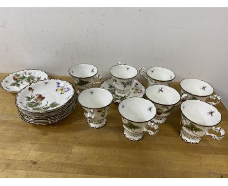A Copeland 16 piece strawberry pattern teaset including footed tea cups and saucers, each cup measures 8cm high