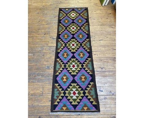 A Maimana Quillam runner with a repeating geometric diamond field, measures 195cm x 62cm