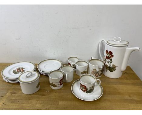 A Susie Cooper nasturtium pattern part coffee service, includes coffee pot, measures 22cm high, five coffee cups, milk jug, s