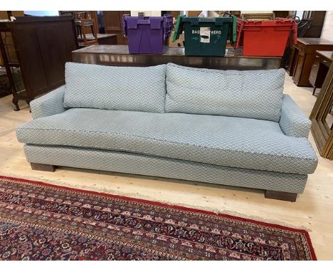 A Charlotte James custom made sofa in a geometric blue and white design fabric with two back cushions and single seat cushion