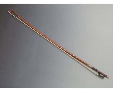 Violin bow by H R Pfretzschner, round stick, mother of pearl eye to frog, impressed with coat of arms, nickel button with ebo