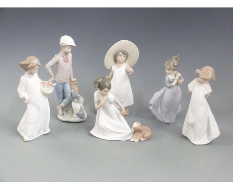 Six Nao child figures including boy with dog, tallest 23cm