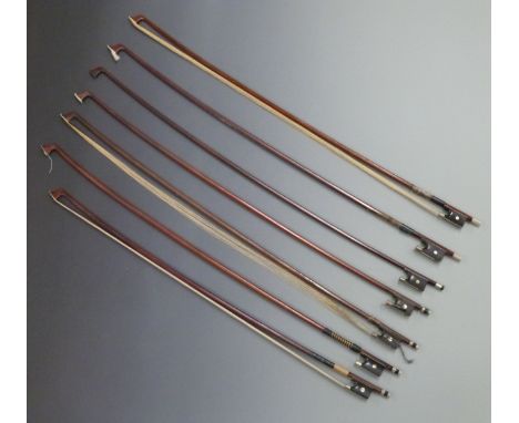 Seven octagonal stick violin bows, various button types, plain eyes to frogs