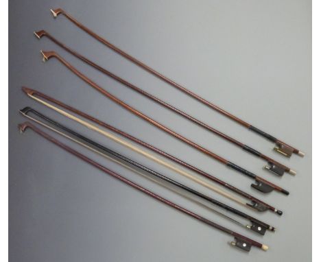 Six round stick violin bows, various button types including bone, ebony, four with plain frogs