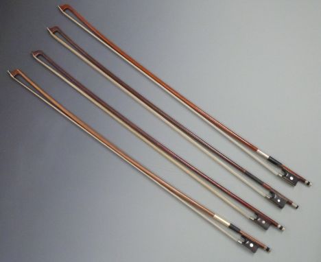 Four round stick violin bows, various button types and grips, plain mother of pearl eyes to frogs