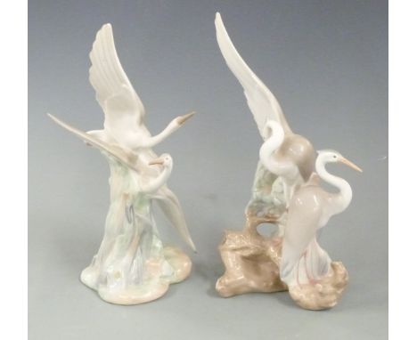 Two Nao figures of herons, tallest 27cm