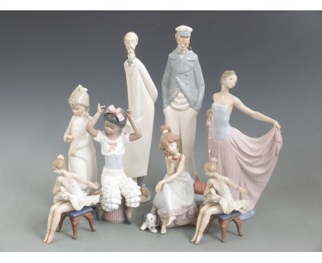 A collection of Lladro and Nao figures, tallest 38cm