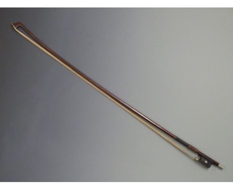 Violin bow by W Dollenz, Leipzig, octagonal stick, Parisian eye to frog, nickel button with mother of pearl inset, 63g