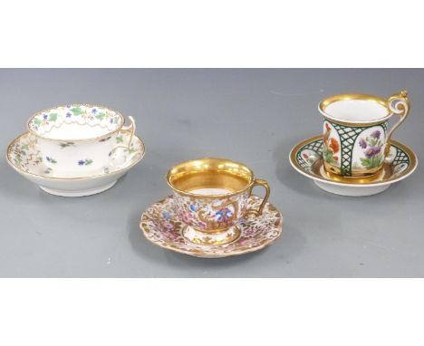 Three 19thC cabinet cups and saucers including a German/Austrian example hand decorated with flowers amongst latticework, tal