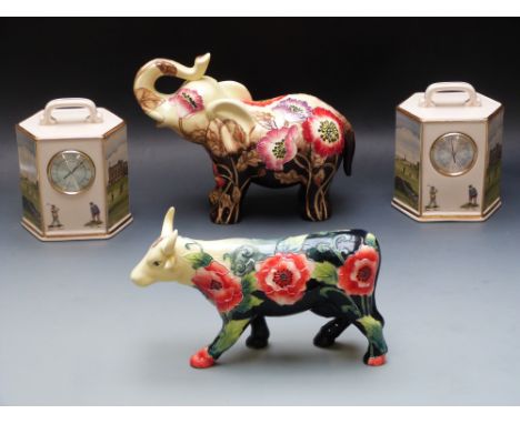 Boxed Tupton Ware elephant and bull, porcelain golfing thermometer and barometer by Pointers of London/Edinburgh, tallest 16c