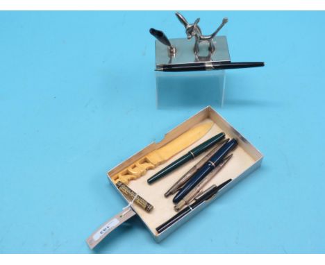 An engine-turned silver pen and pencil, Parker fountain pens Duofold and 17, and three other items
